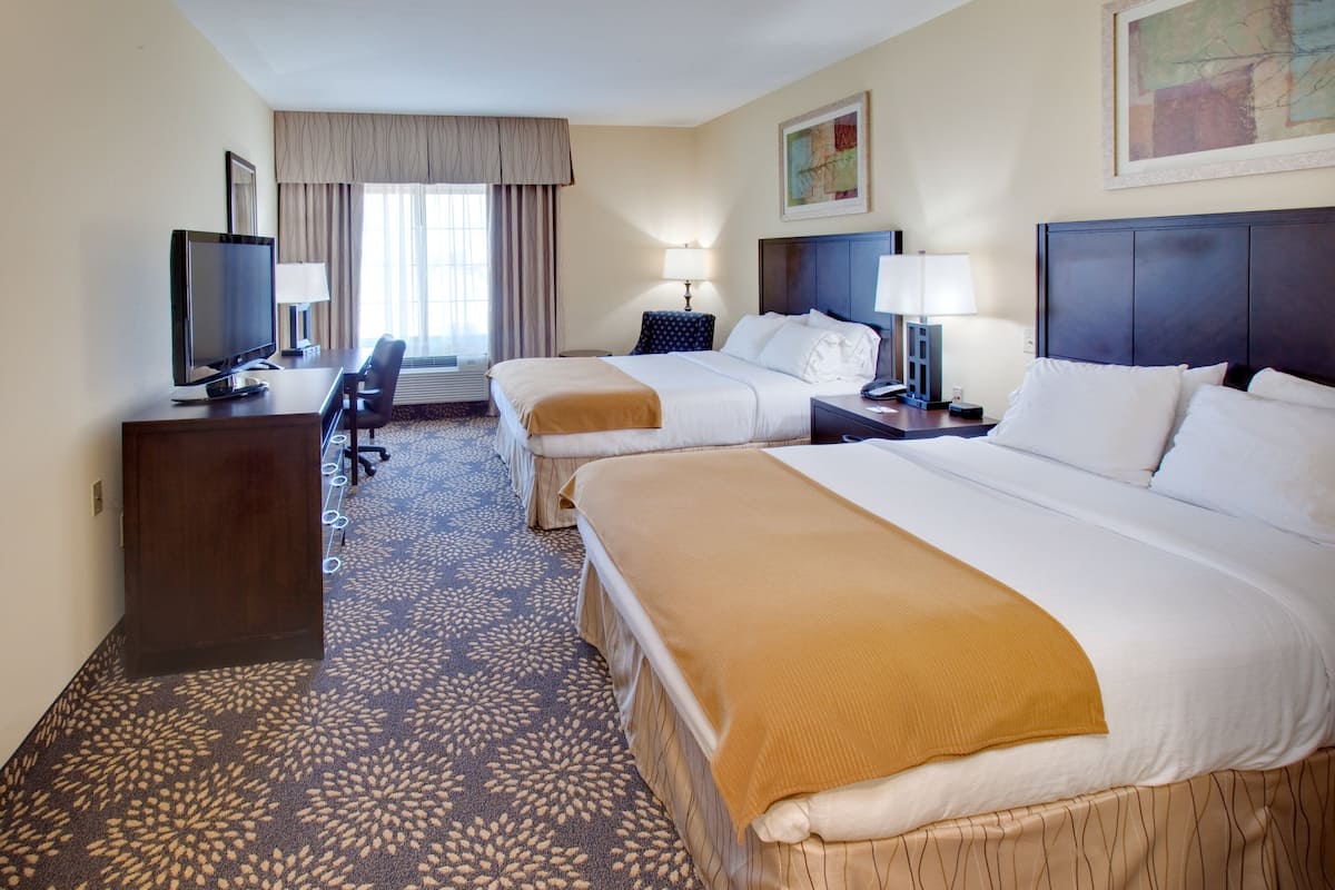 desk, blackout curtains, iron/ironing board, free cots/infant beds