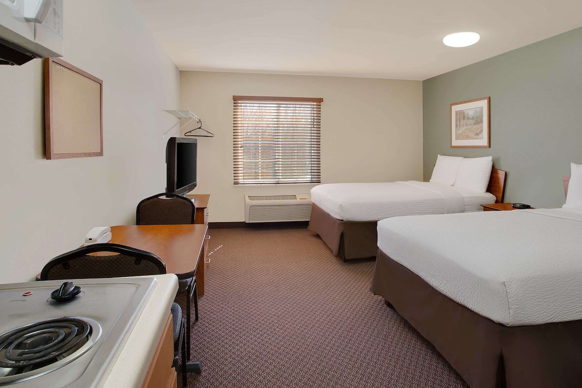 Desk, free WiFi, bed sheets, alarm clocks