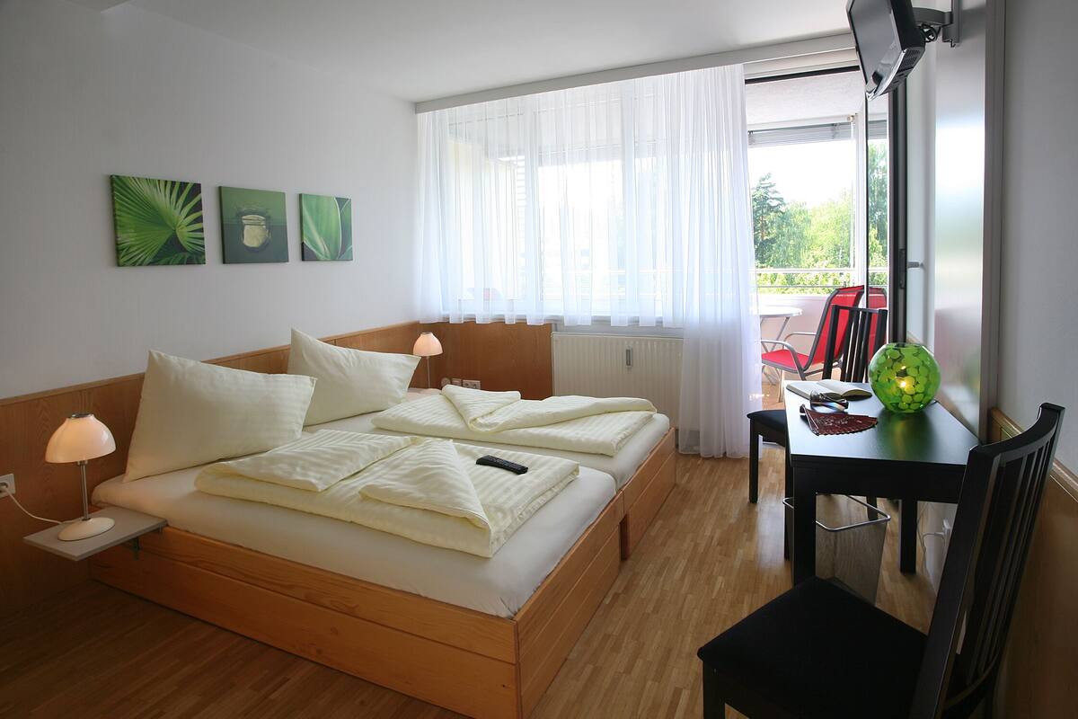 double room, balcony | in-room safe, desk, iron/ironing board, free wifi