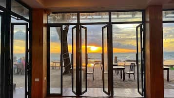 Breakfast, lunch, dinner served; Asian cuisine, beach views