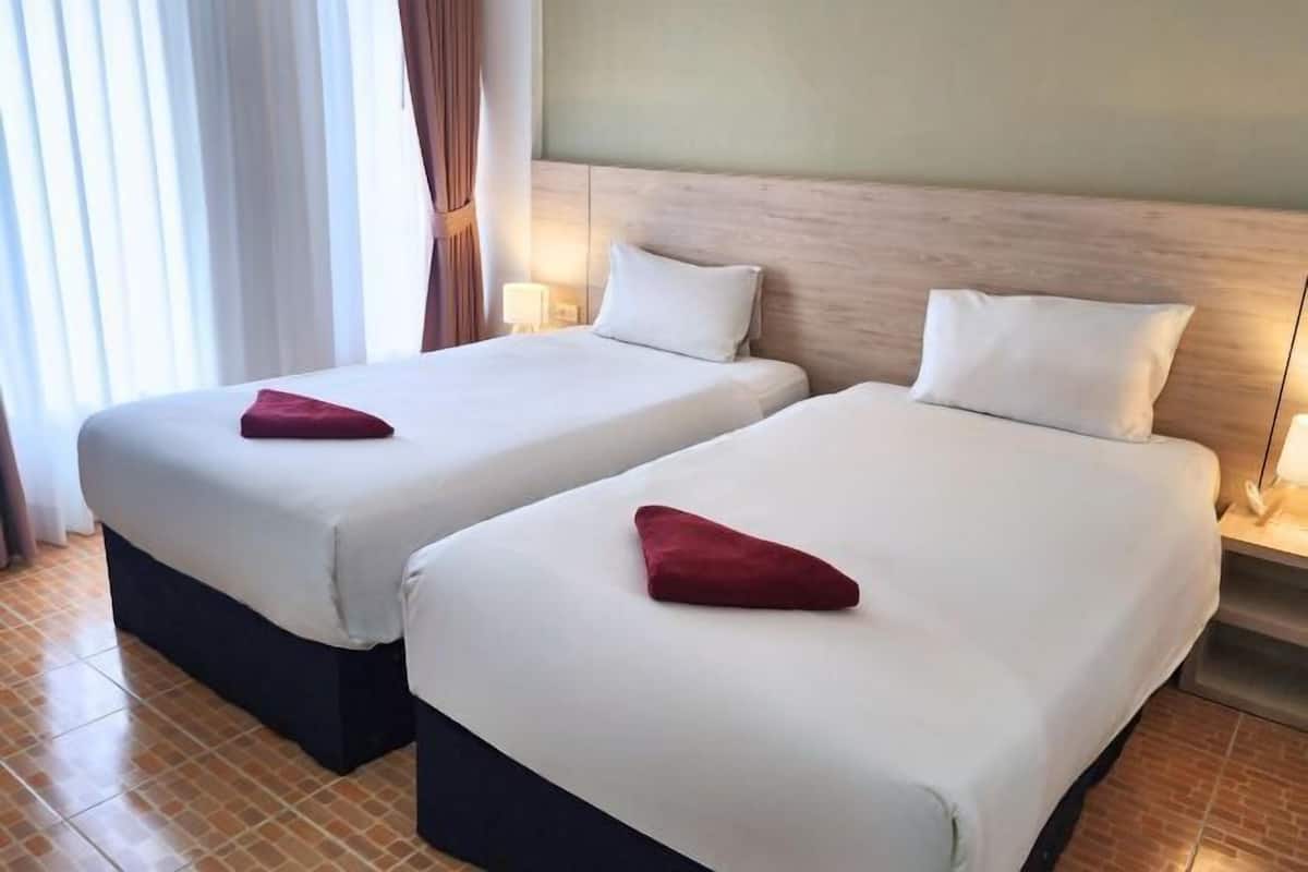 Coffres-forts dans les chambres, Wi-Fi gratuit, draps fournis