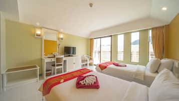 Deluxe Room | 2 bedrooms, in-room safe, desk, blackout curtains