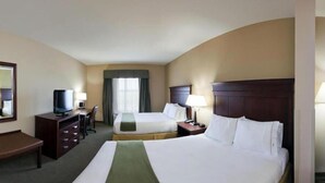 A hotel room with two beds, a desk with a TV, a chair, and a window with curtains. - Holiday Inn Express Hotel & Suites POTEAU by IHG (Poteau)