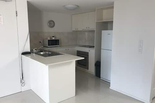 Apartment, 2 Bedrooms | Private kitchen | Fridge, microwave, stovetop, coffee/tea maker