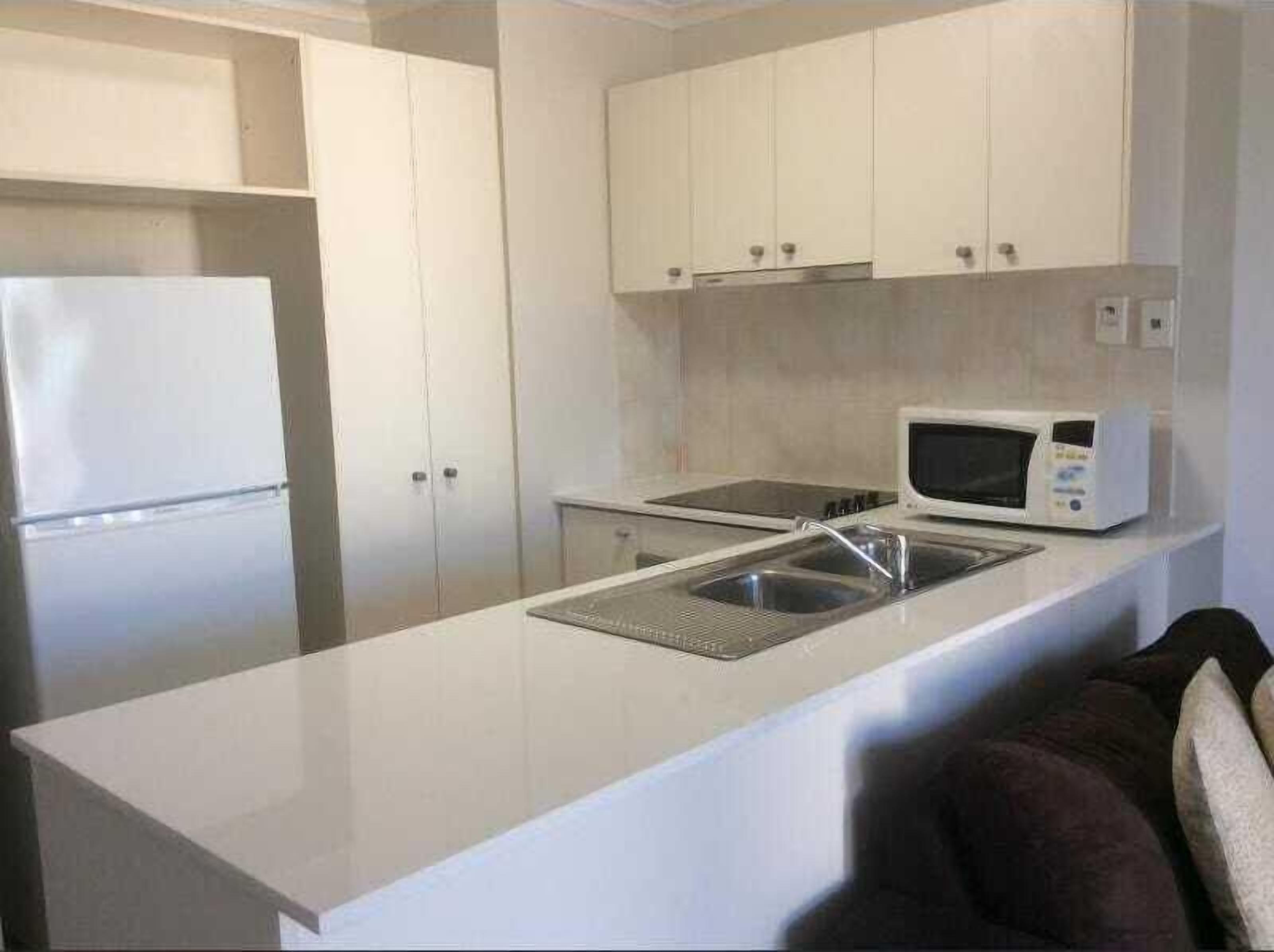 Apartamento, 1 habitación | Cocina privada | Frigorífico, microondas, placa de cocina y cafetera o tetera