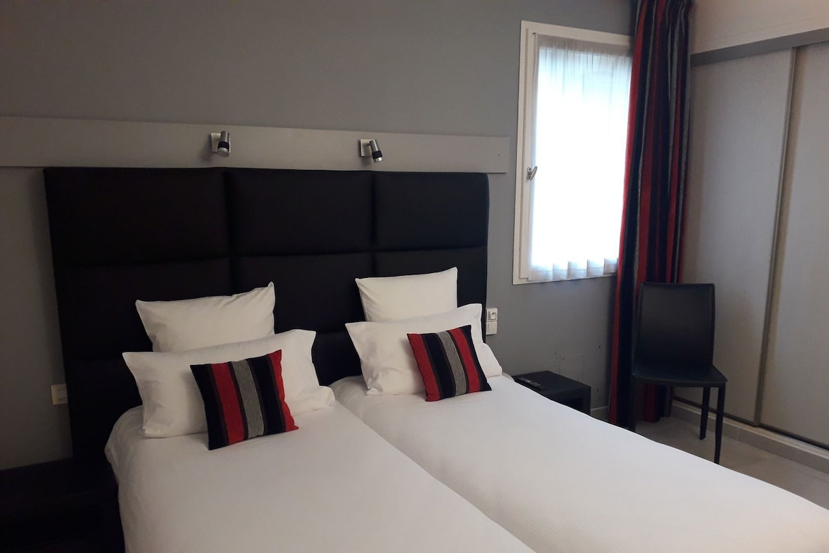 In-room safe, desk, blackout curtains, iron/ironing board (on request)
