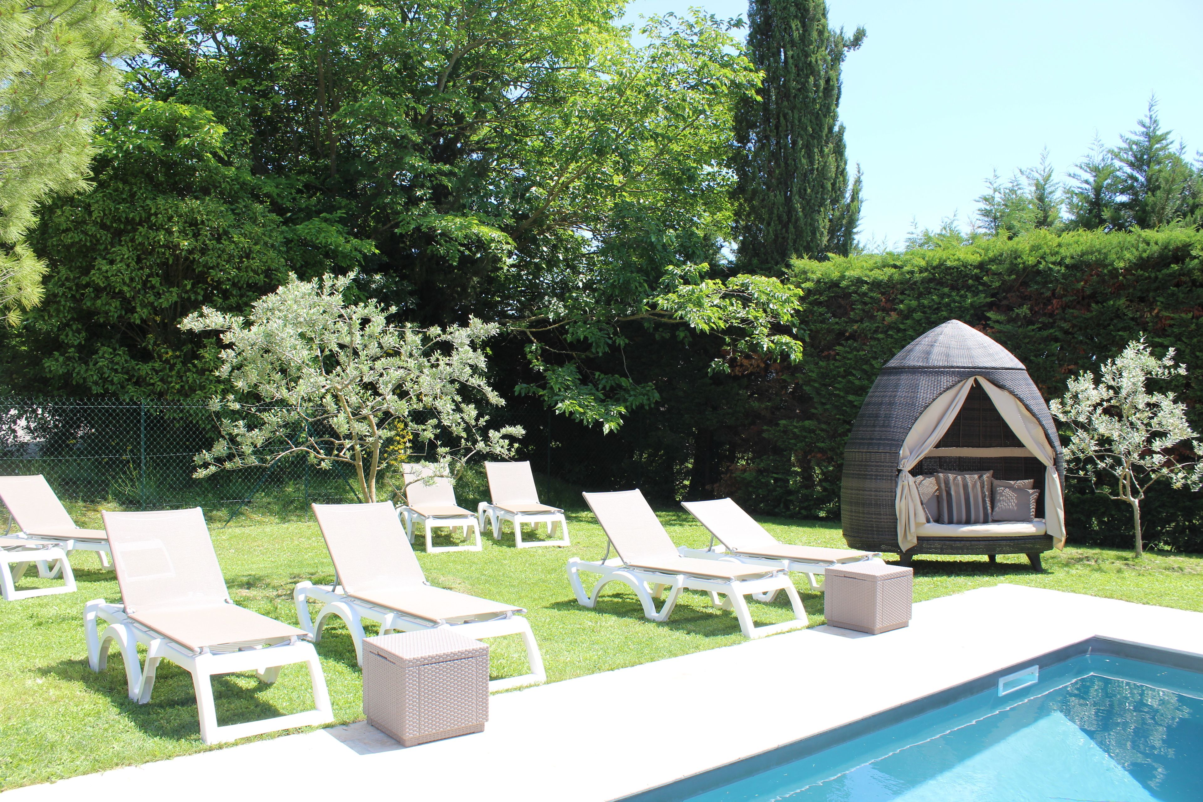 outdoor pool, pool loungers