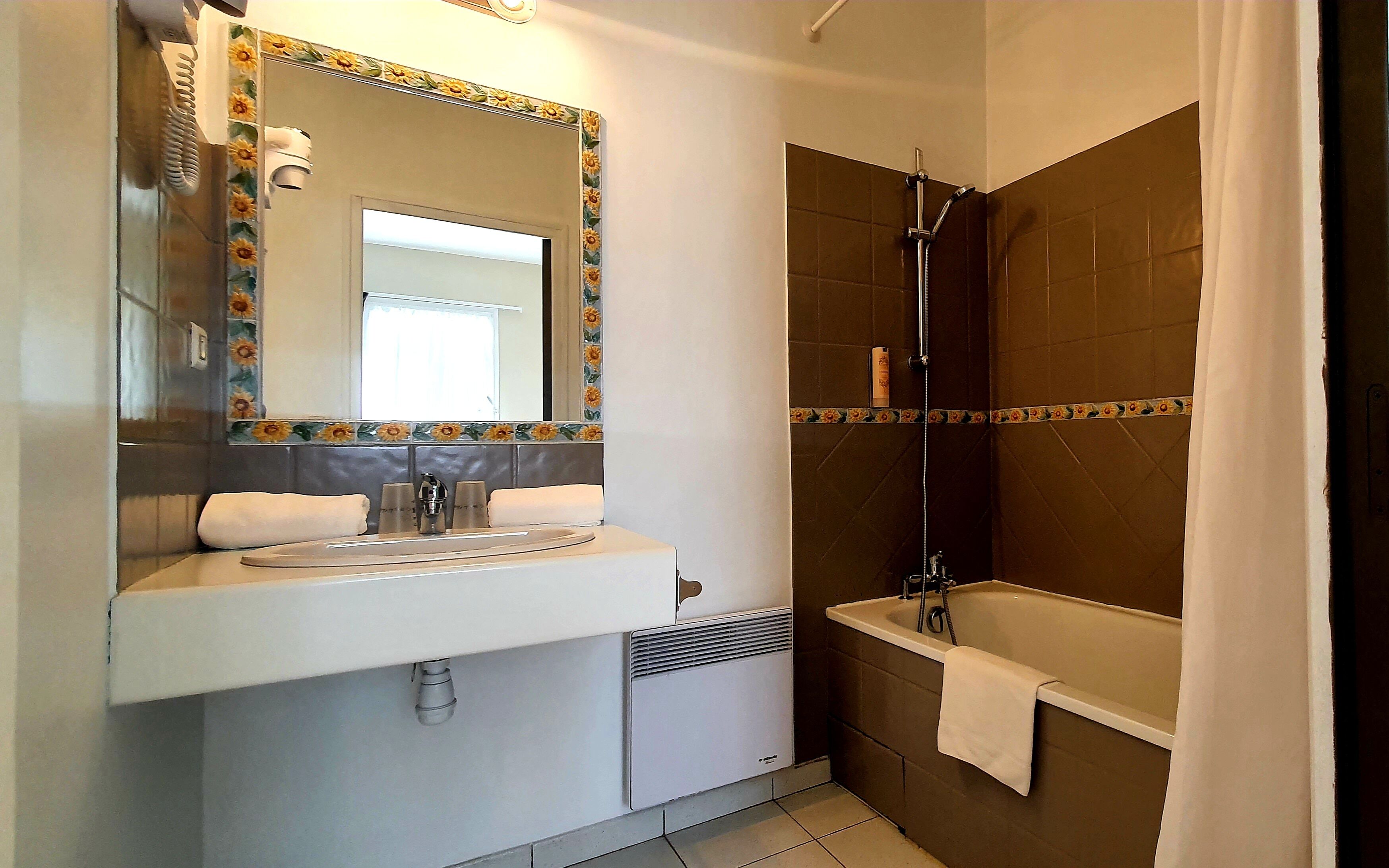 basic room, 1 queen bed | bathroom | hair dryer, towels, soap, shampoo