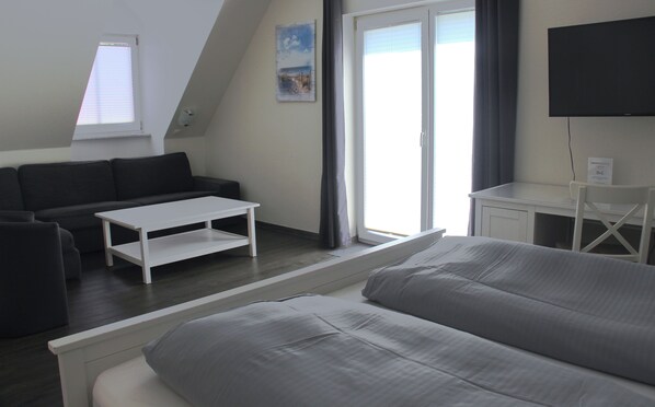Desk, laptop workspace, free WiFi, bed sheets