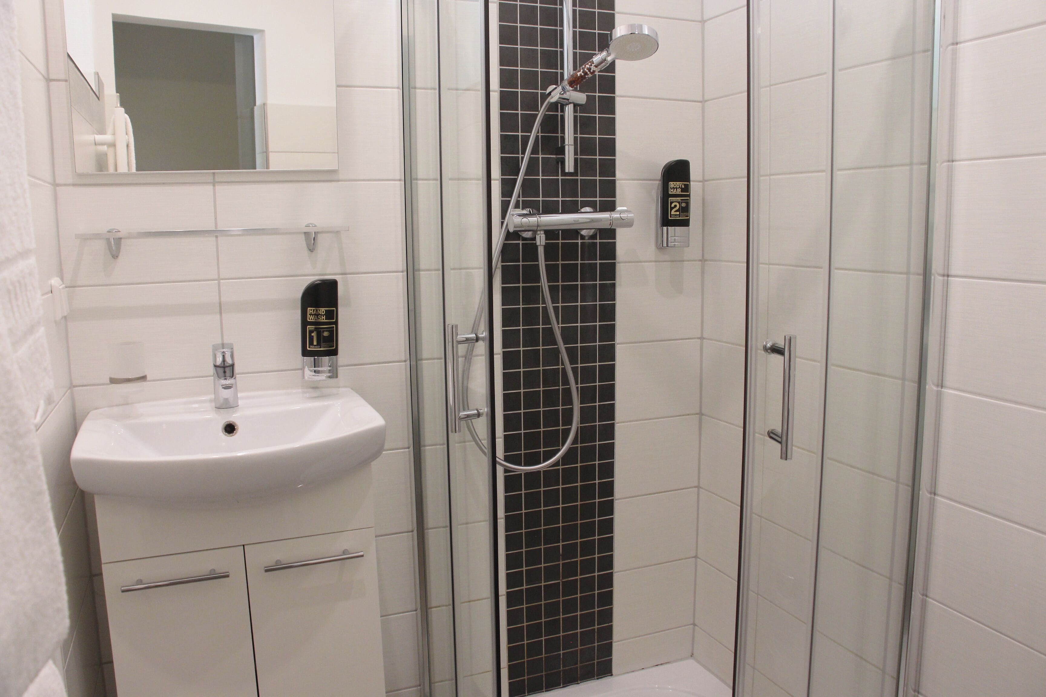 room | bathroom | shower, hair dryer, towels