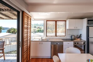 Two Bedroom Apartment with Ocean View | Private kitchen | Fridge, microwave, stovetop, toaster - Onetangi Beach Apartments (Waiheke Island)