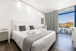 Superior Room, Sea View | Minibar, in-room safe, desk, blackout drapes