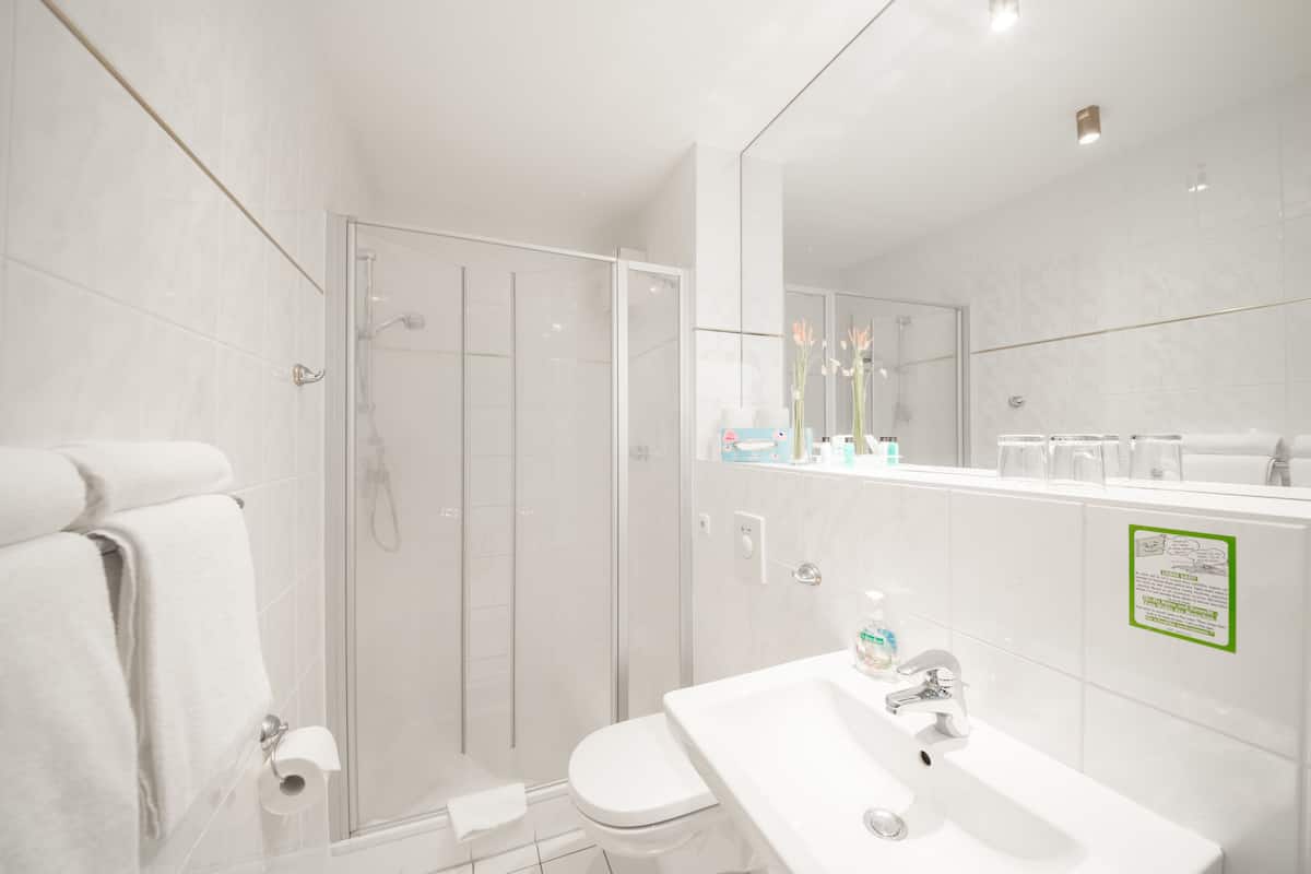 Shower, free toiletries, hair dryer, towels