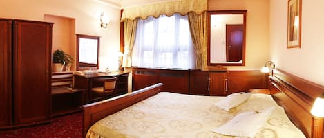 Ropa de cama de alta calidad y minibar