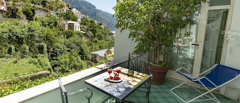 Superior-værelse til 3 personer | Terrasse/gårdhave