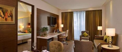 Premium bedding, down comforters, minibar, in-room safe