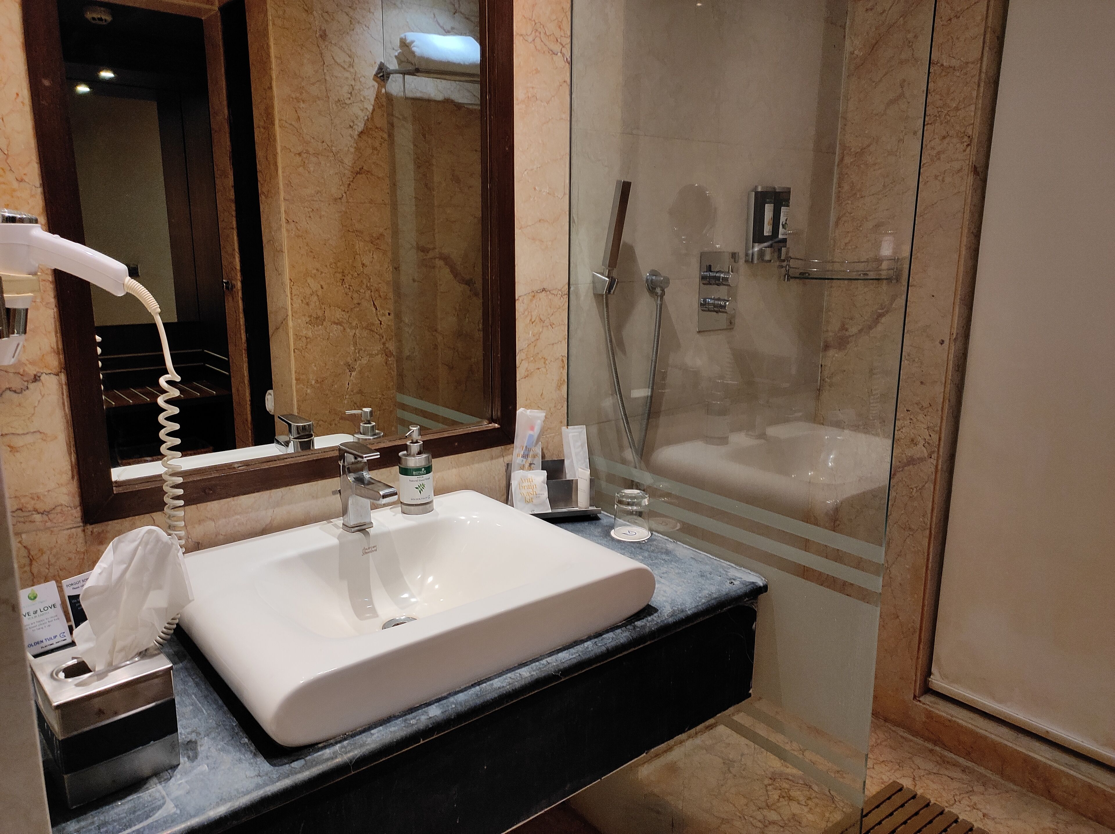 shower, eco-friendly toiletries, hair dryer, bathrobes