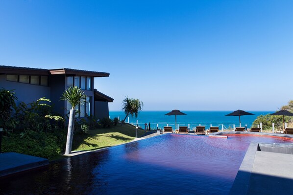 Outdoor pool, pool umbrellas, pool loungers