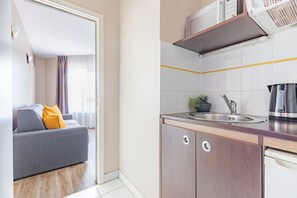 Departamento, 1 habitación | Cocineta privada | Refrigerador, microondas, lavavajillas y cafetera y tetera