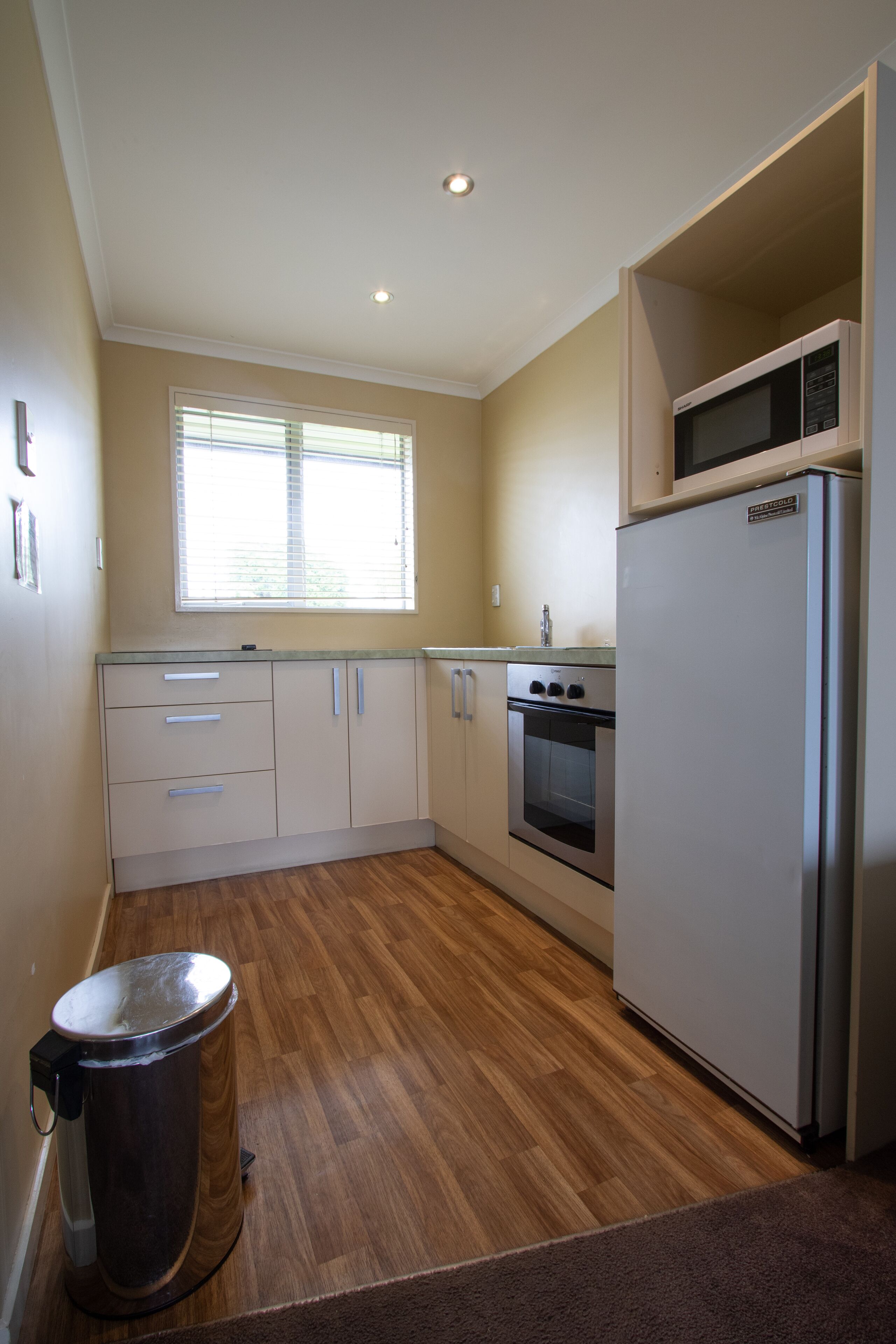 Family Apartment, 2 Bedrooms | Private kitchen | Fridge, microwave, stovetop, coffee/tea maker