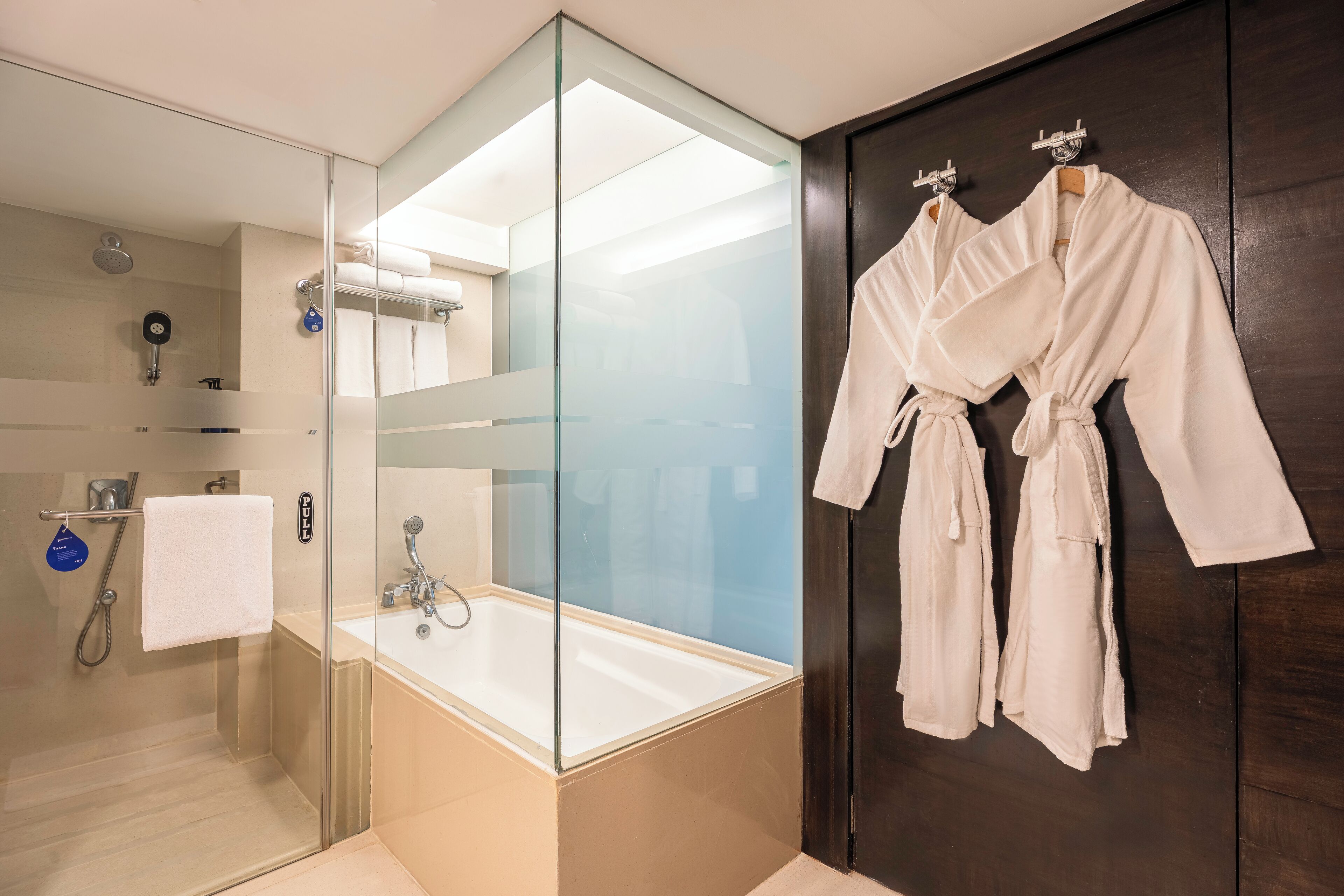 junior suite | bathroom | shower, rainfall showerhead, designer toiletries, hair dryer