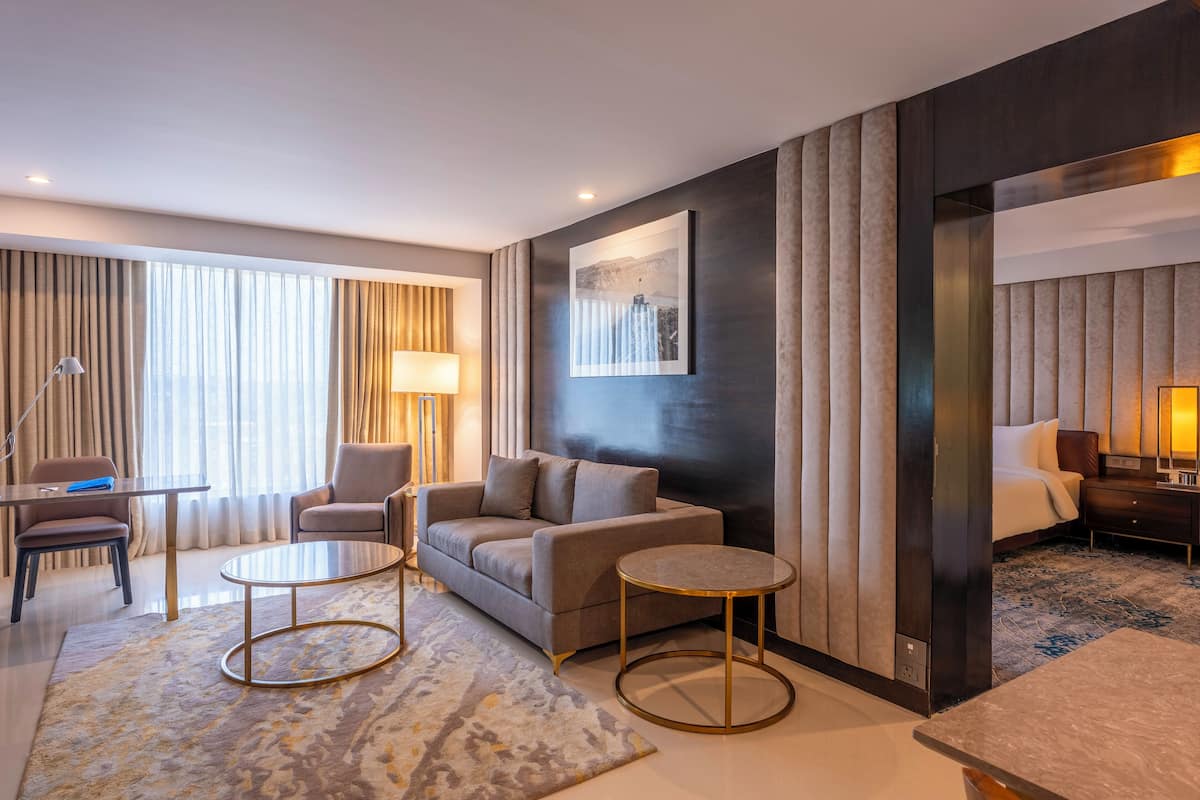 Junior Suite | 1 bedroom, premium bedding, memory foam beds, in-room safe