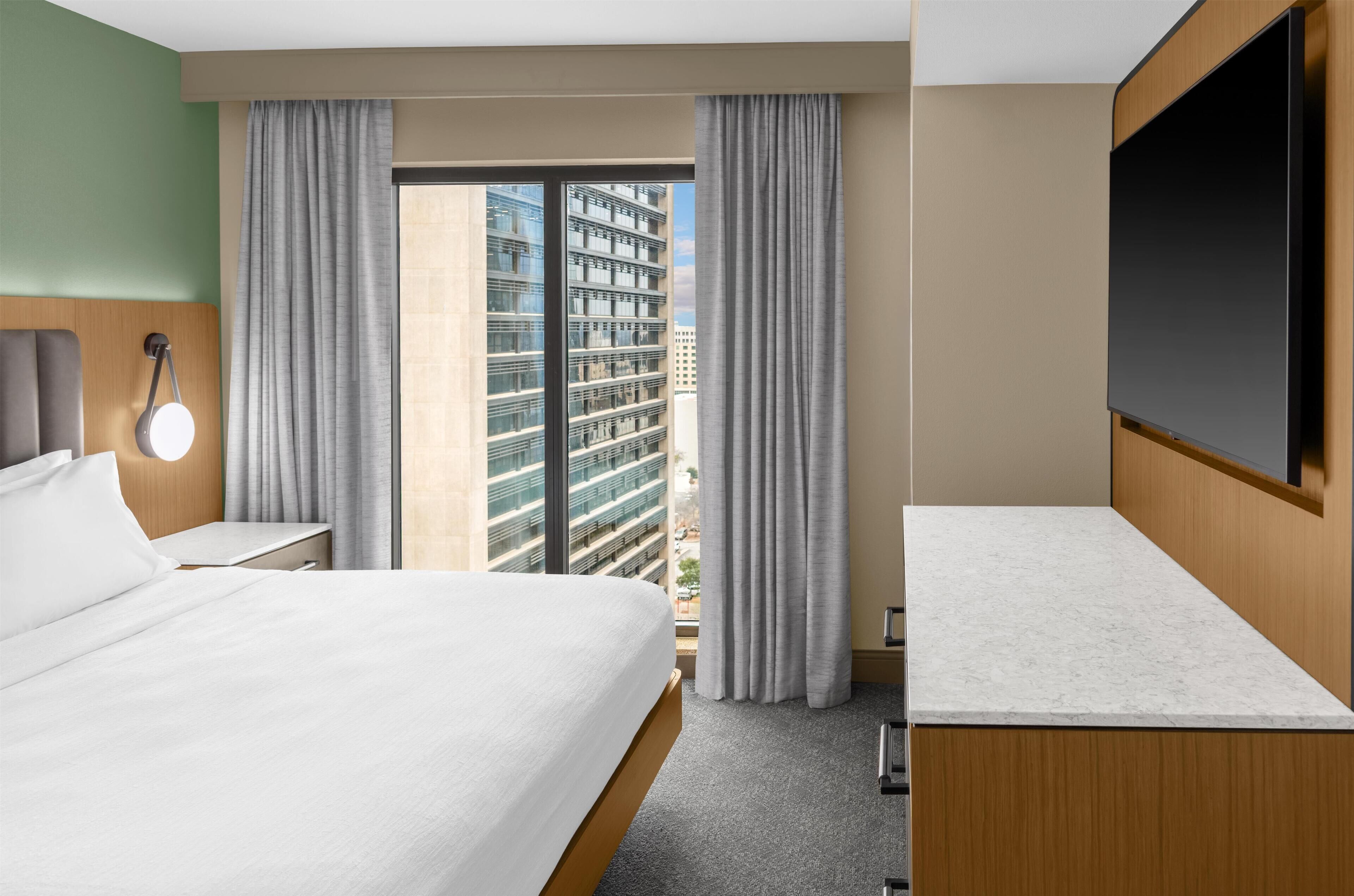 Hypo-allergenic bedding, pillow-top beds, in-room safe