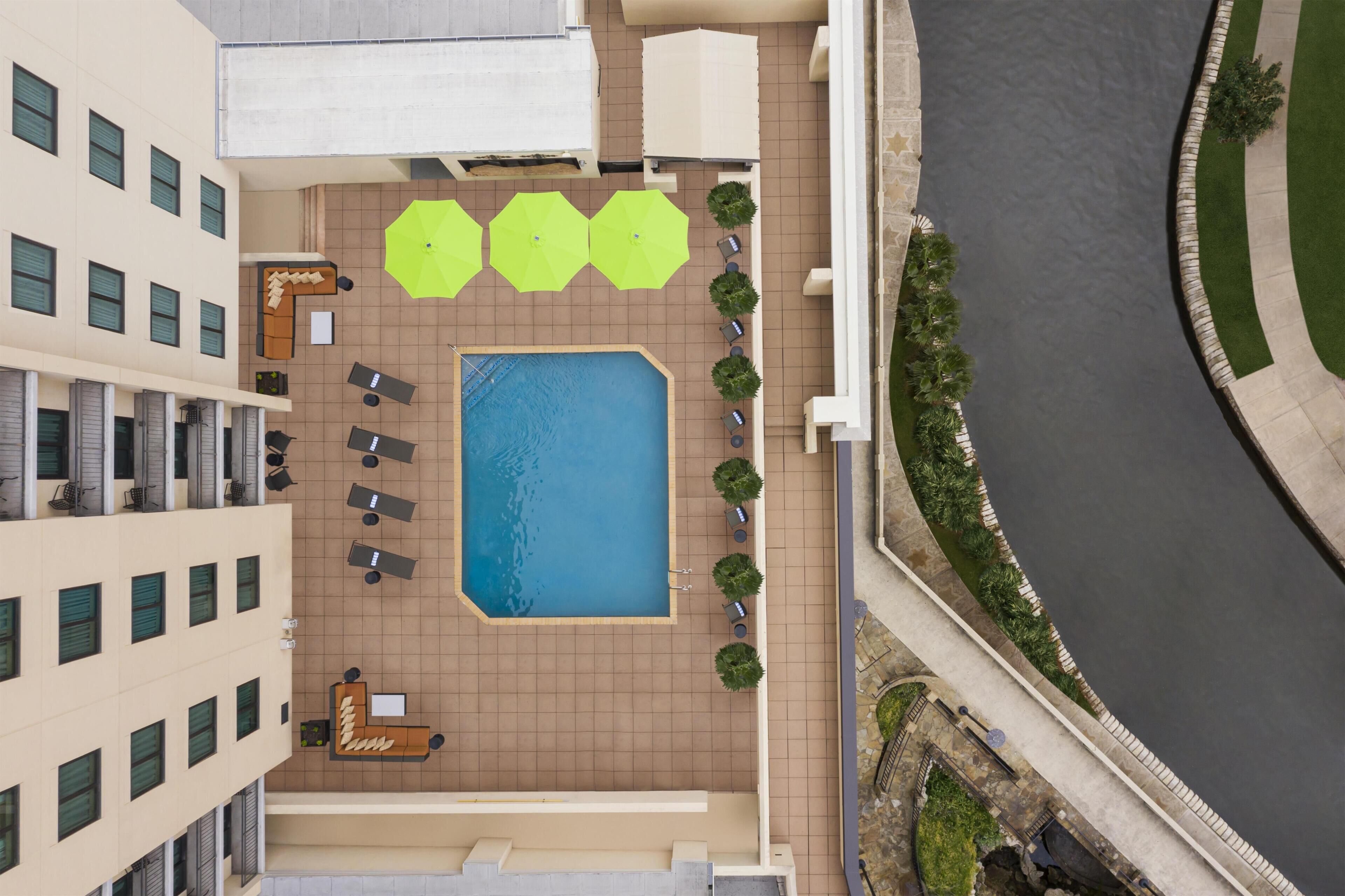 Outdoor pool, open 6:30 AM to 10:00 PM, pool loungers