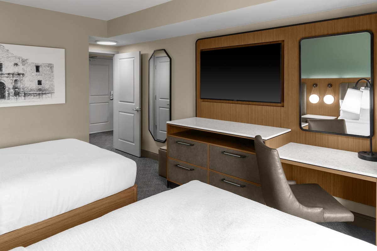 Hypo-allergenic bedding, pillow-top beds, in-room safe