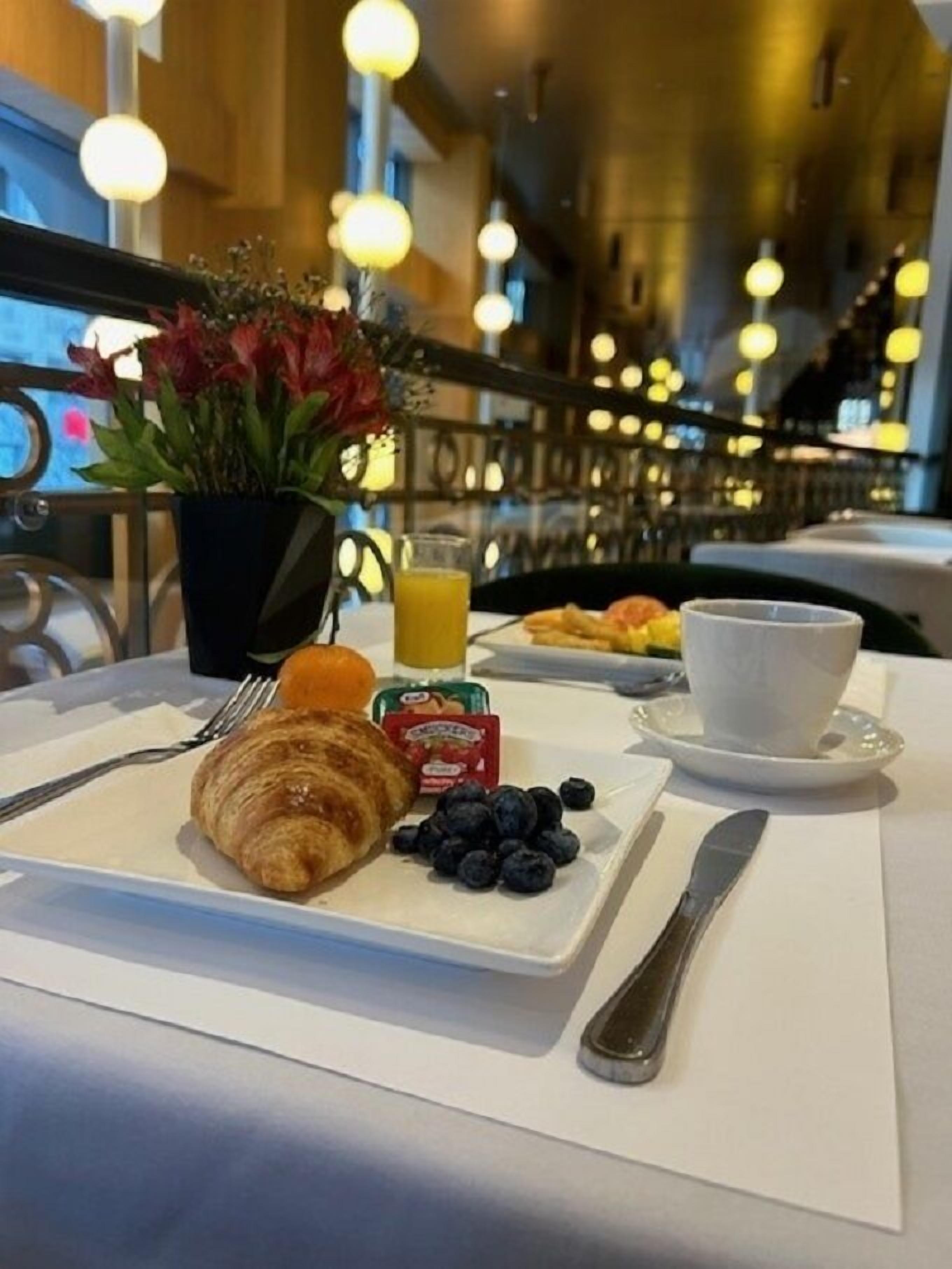 Daily buffet breakfast (CAD 26.44 per person)