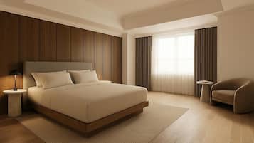 A modern hotel room with a large bed, a side table, a chair, and a window with curtains.