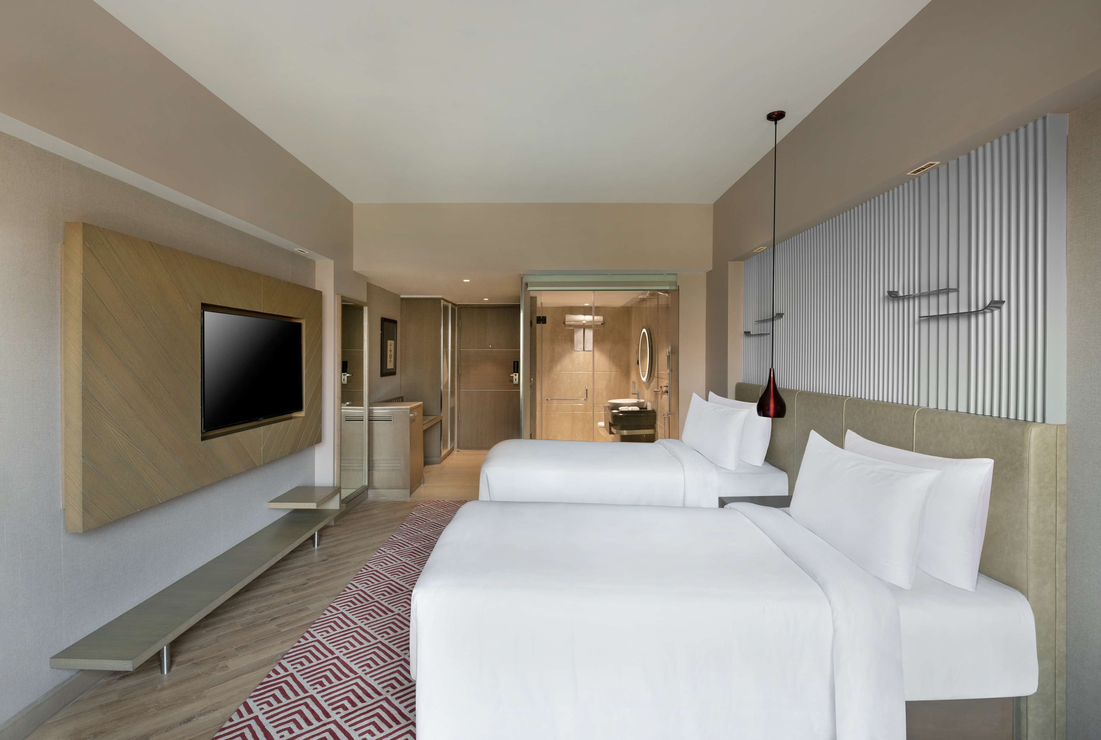 deluxe room | minibar, in-room safe, desk, laptop workspace