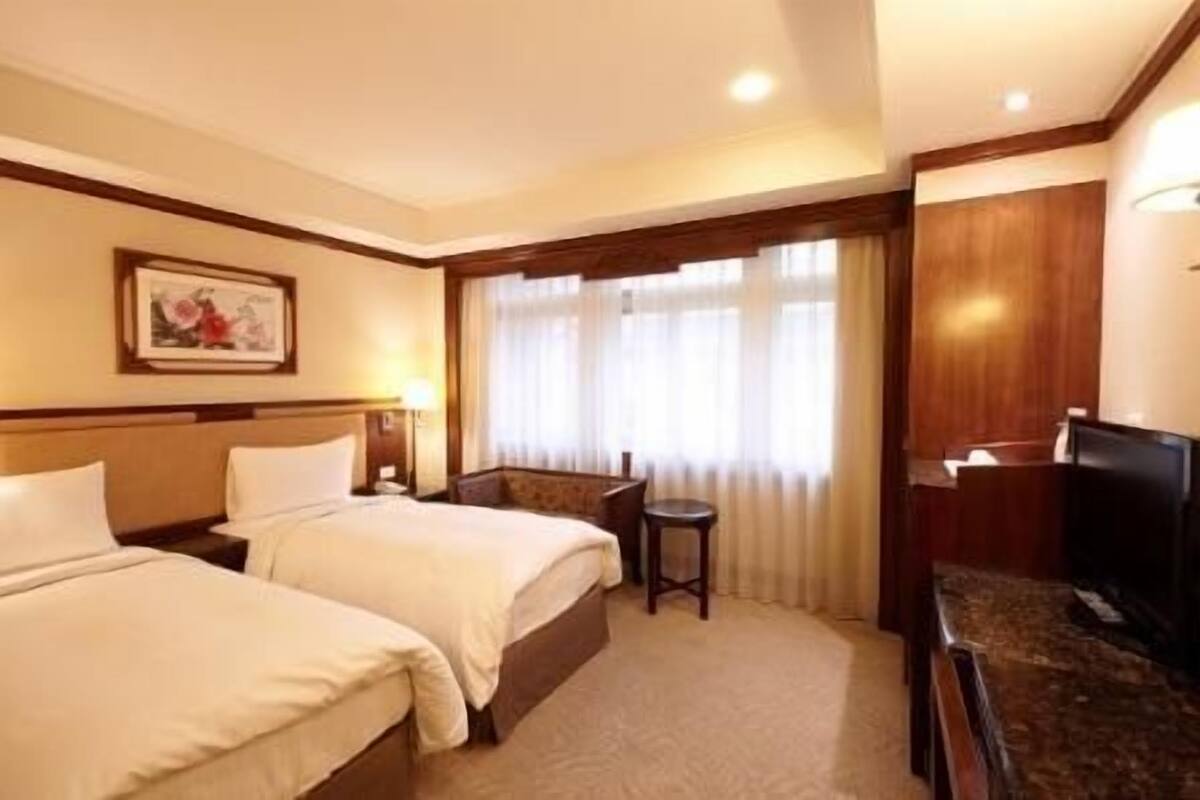 Quarto luxo | Frigobar, escrivaninha, ferros/tábuas de passar roupa, Wi-Fi de cortesia