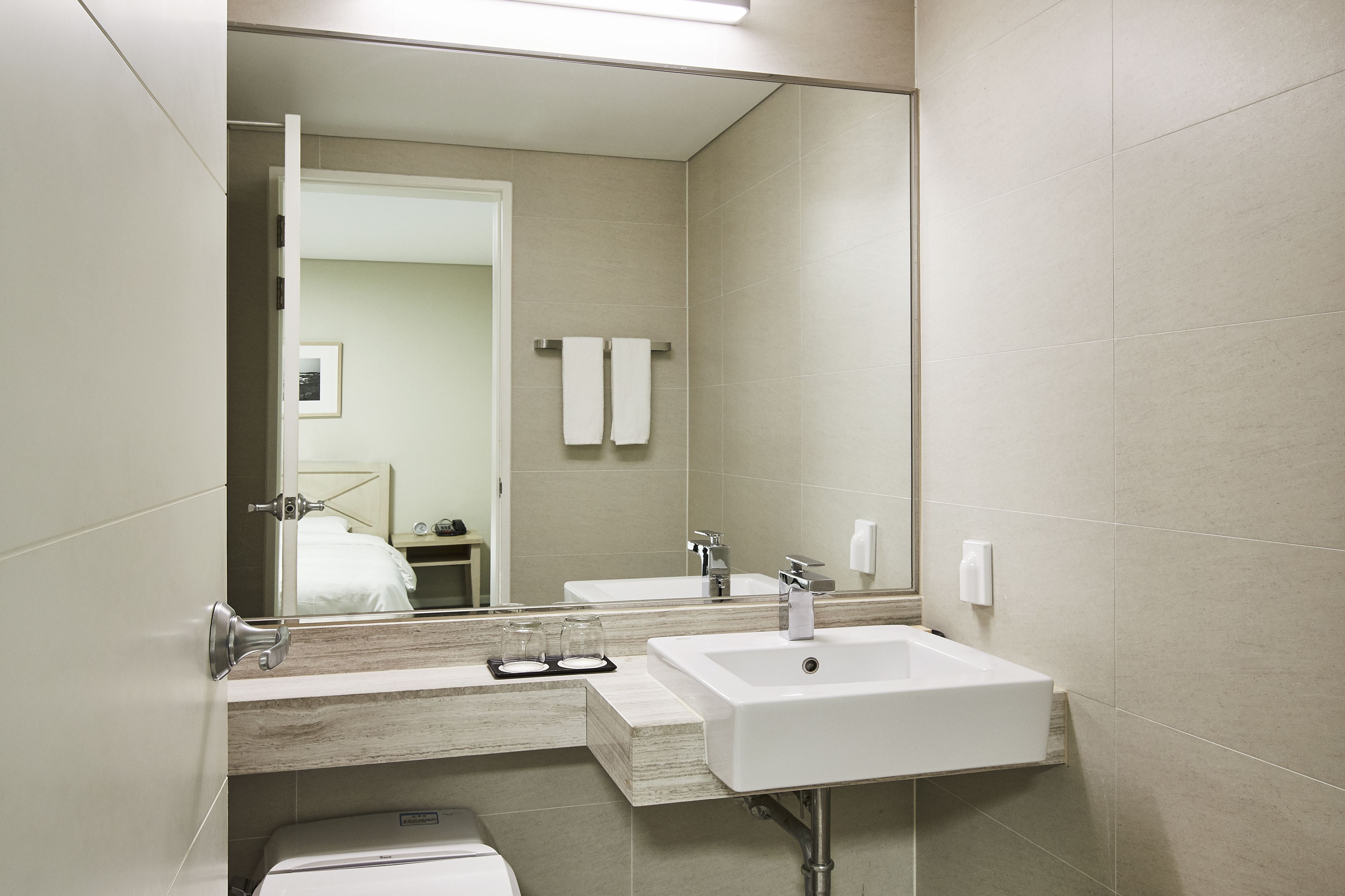 bathtub, free toiletries, hair dryer, slippers