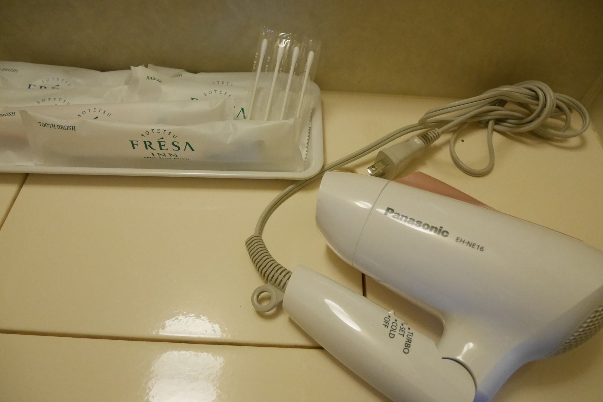 combined shower/bathtub, hair dryer, slippers, electronic bidet