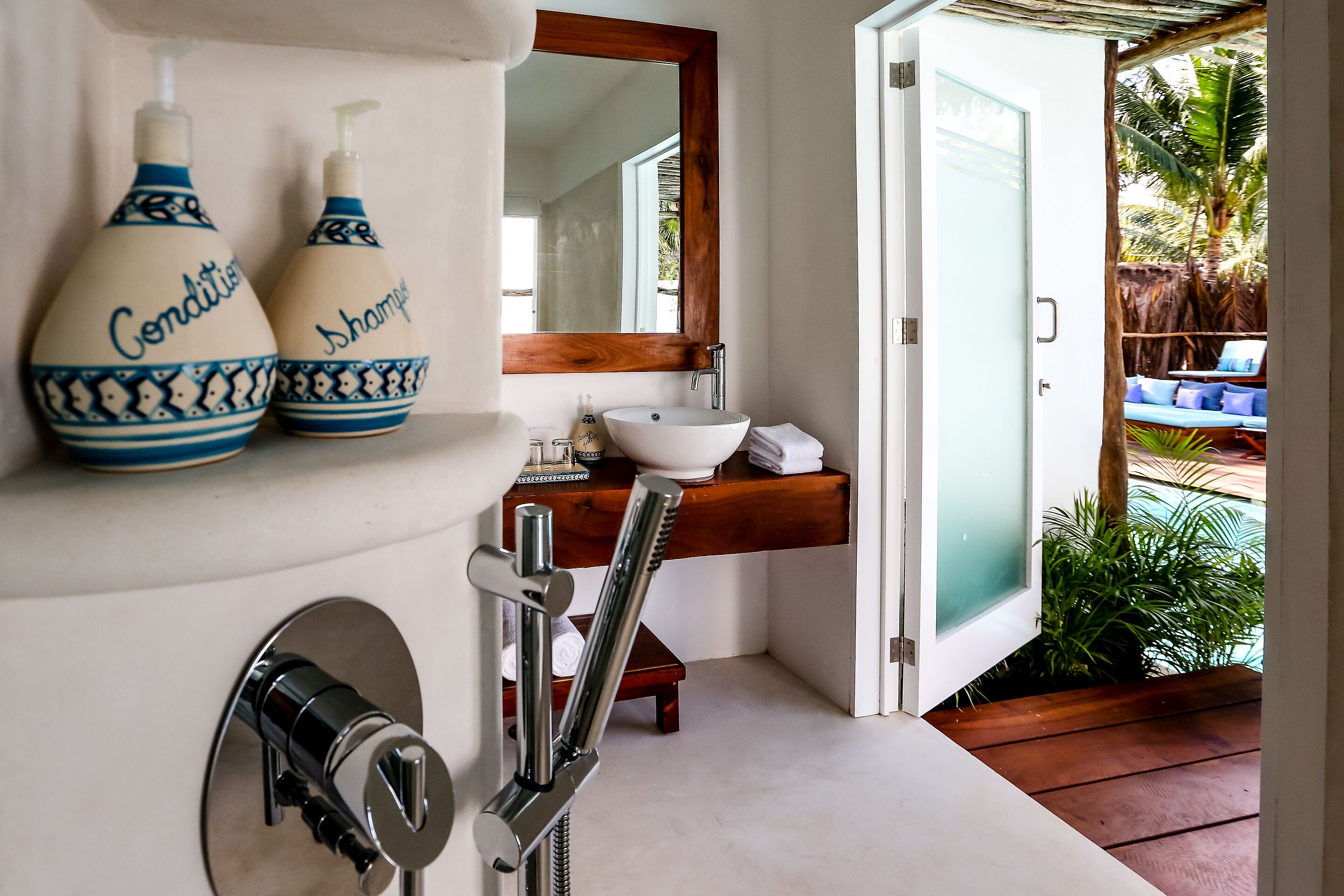 swim up (2 queens) | bathroom | shower, rainfall showerhead, eco-friendly toiletries, hair dryer