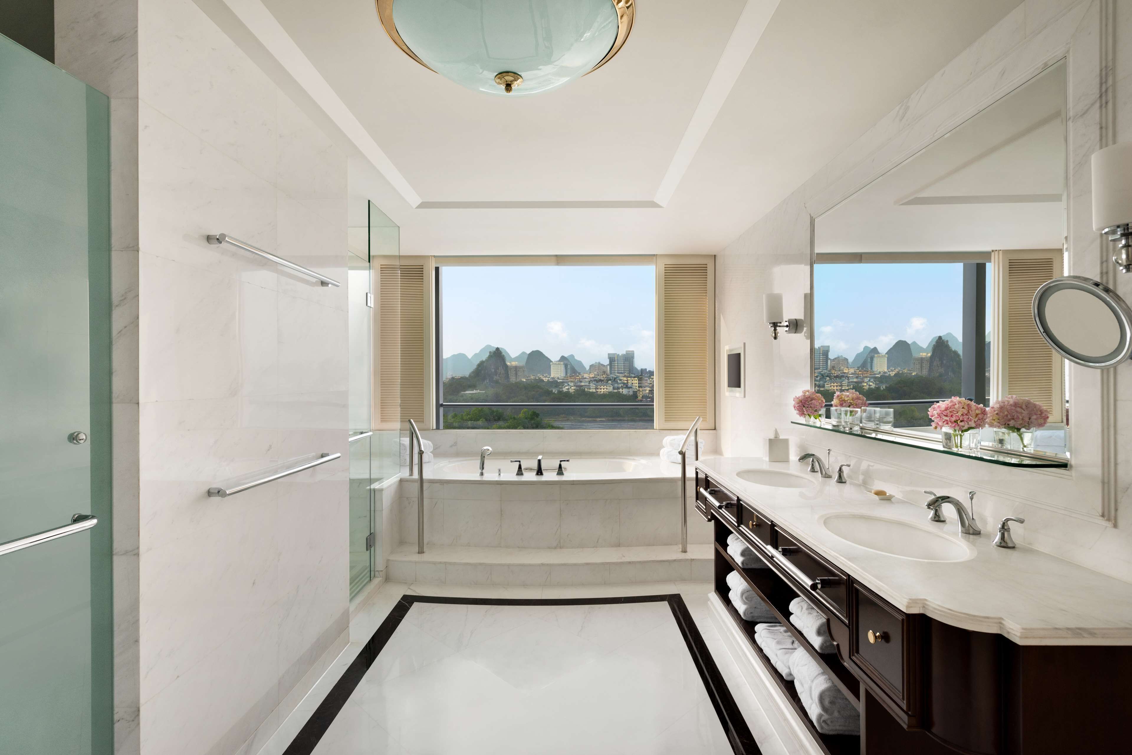 separate bathtub and shower, designer toiletries, hair dryer, bathrobes