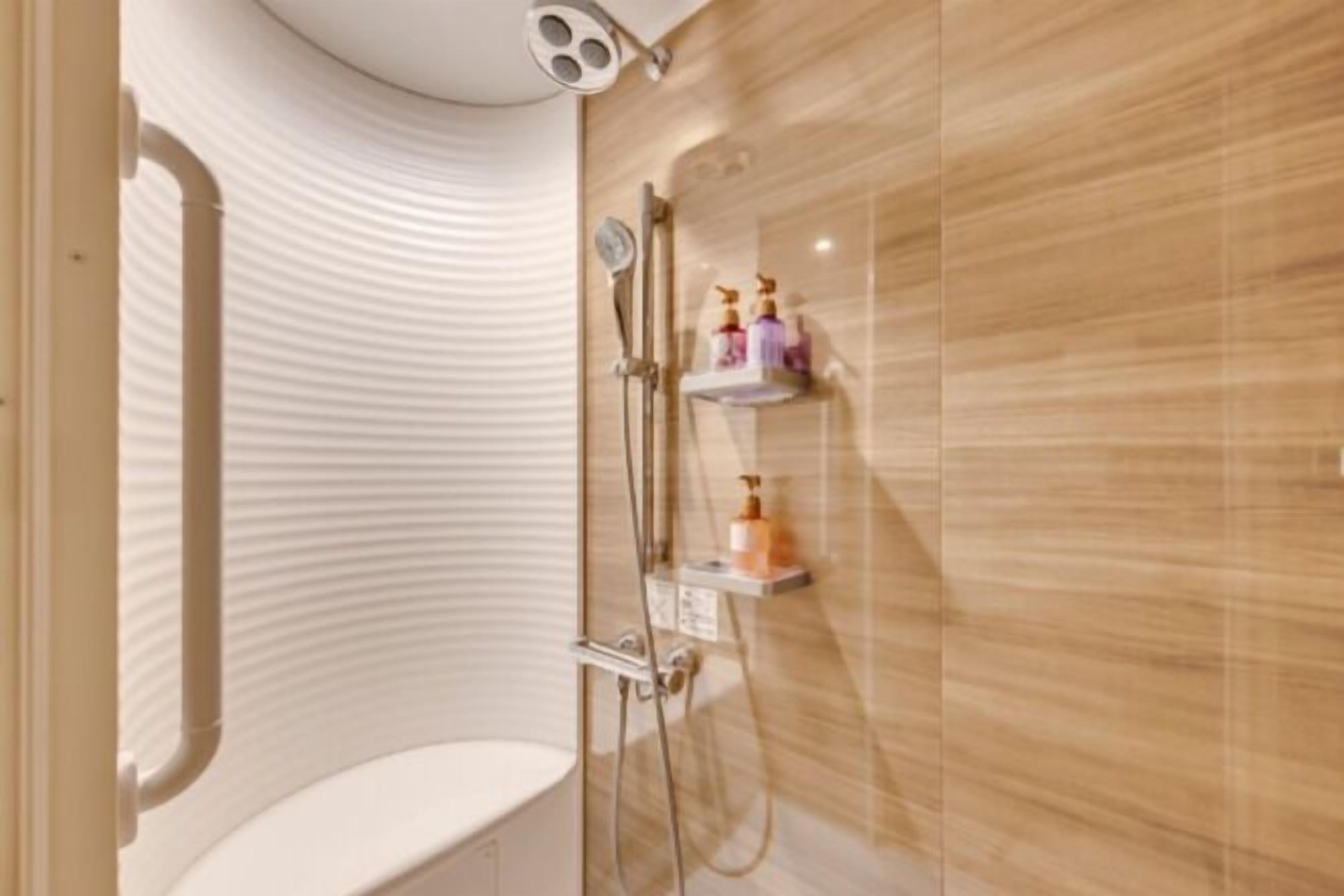 Bathroom | Free toiletries, hair dryer, slippers, electronic bidet