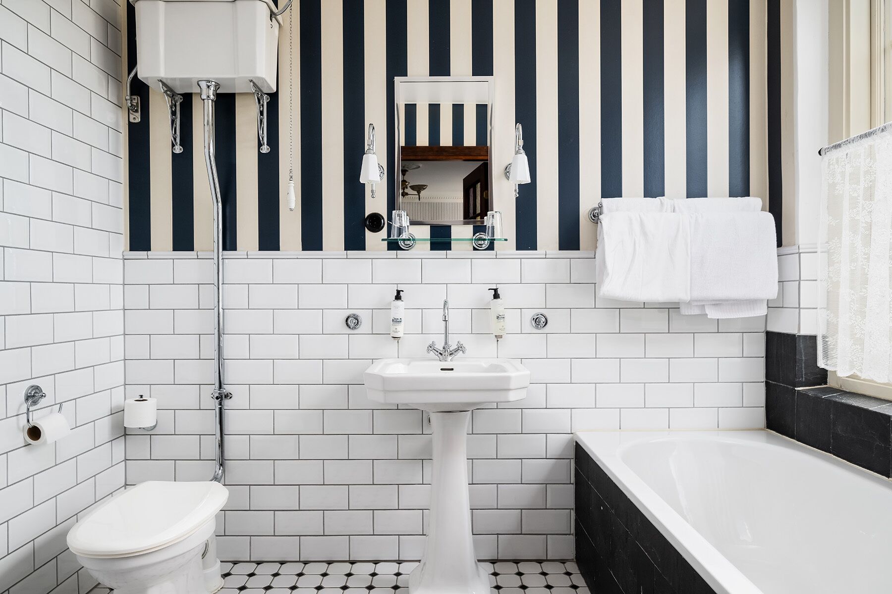 deluxe double room | bathroom | designer toiletries, hair dryer, towels, soap