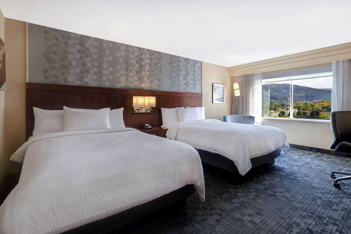 premium bedding, down duvets, pillow-top beds, individually decorated