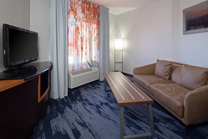 Suite, 1 habitación | Sala de estar | Smart TV y Netflix 