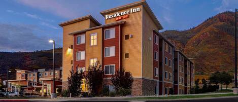 A multi-story hotel with a sign reading "Residence Inn Marriott" on the facade.