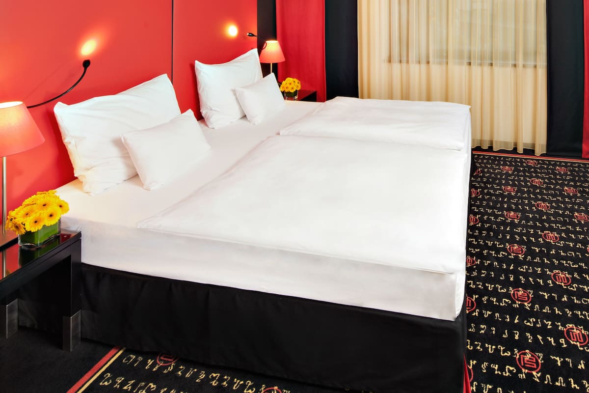 Hypo-allergenic bedding, minibar, in-room safe, desk