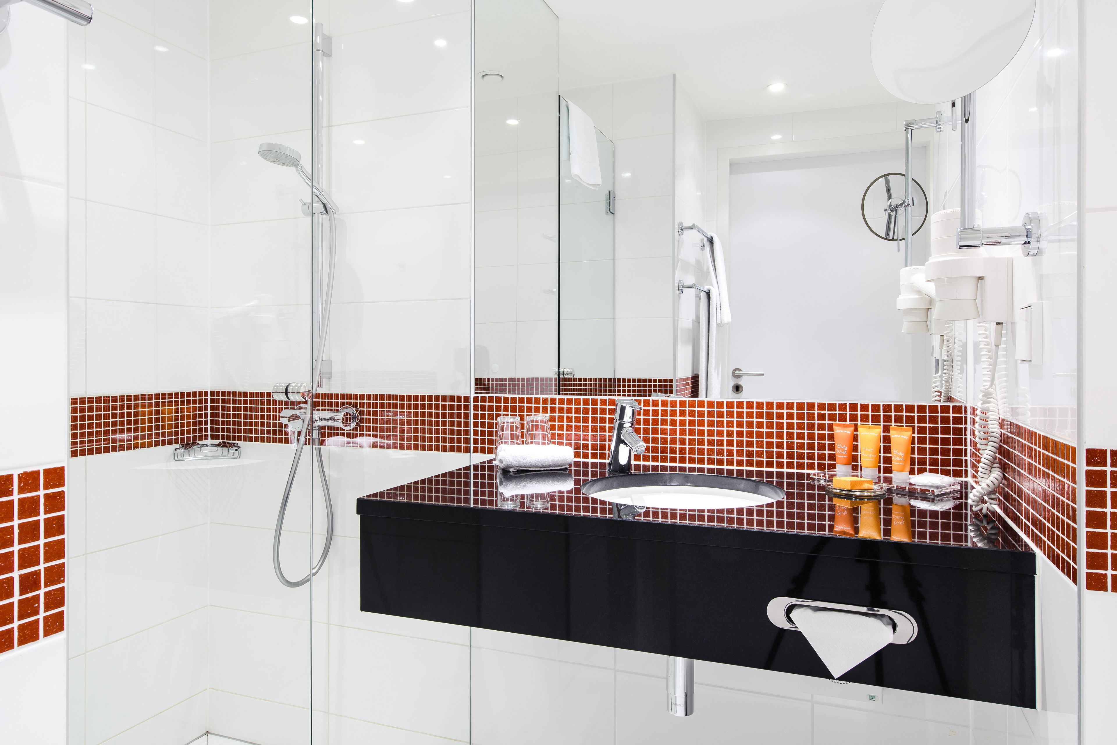 eco-friendly toiletries, hair dryer, towels