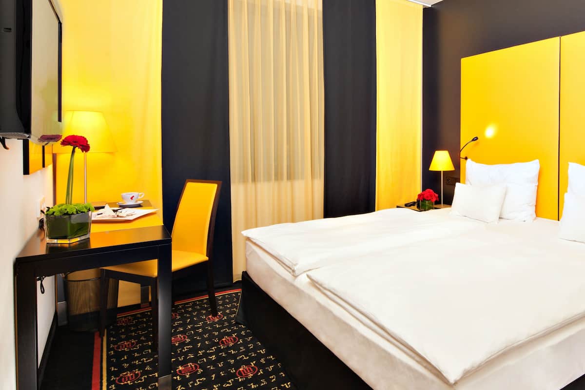 Hypo-allergenic bedding, minibar, in-room safe, desk