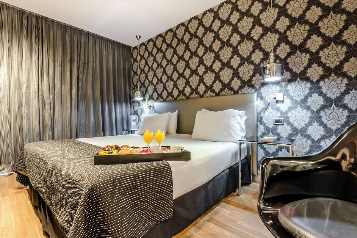 Suite junior (Single Use) | Minibar, caja fuerte, escritorio y wifi gratis