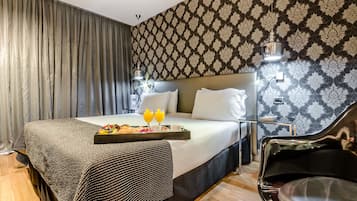Suite junior | Minibar, caja fuerte, escritorio y wifi gratis