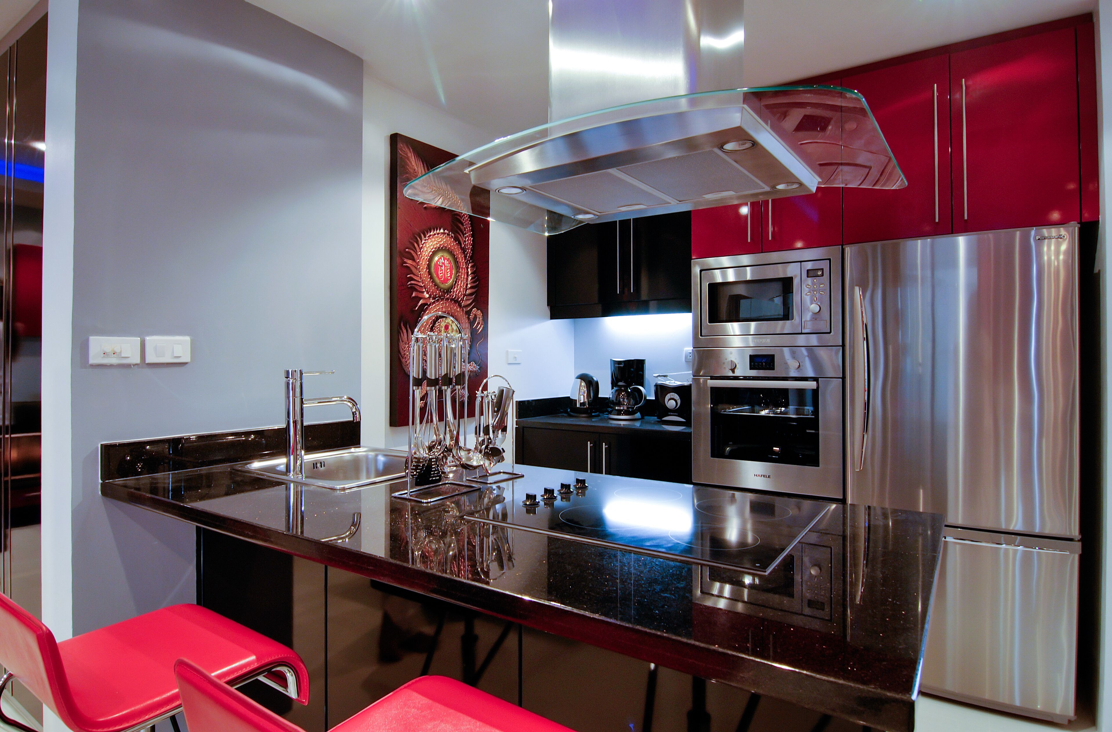 full-sized fridge, microwave, stovetop, toaster