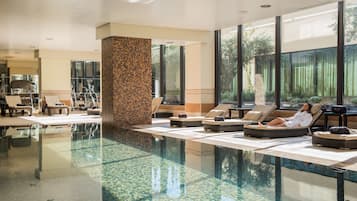 Indoor pool, outdoor pool, pool umbrellas, pool loungers