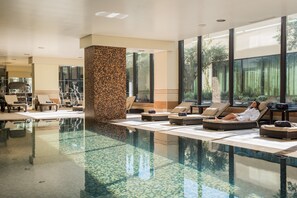 Indoor pool, outdoor pool, pool umbrellas, pool loungers